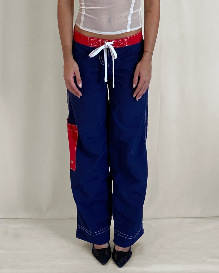 Unreleased contrast stitch pant in blue/red